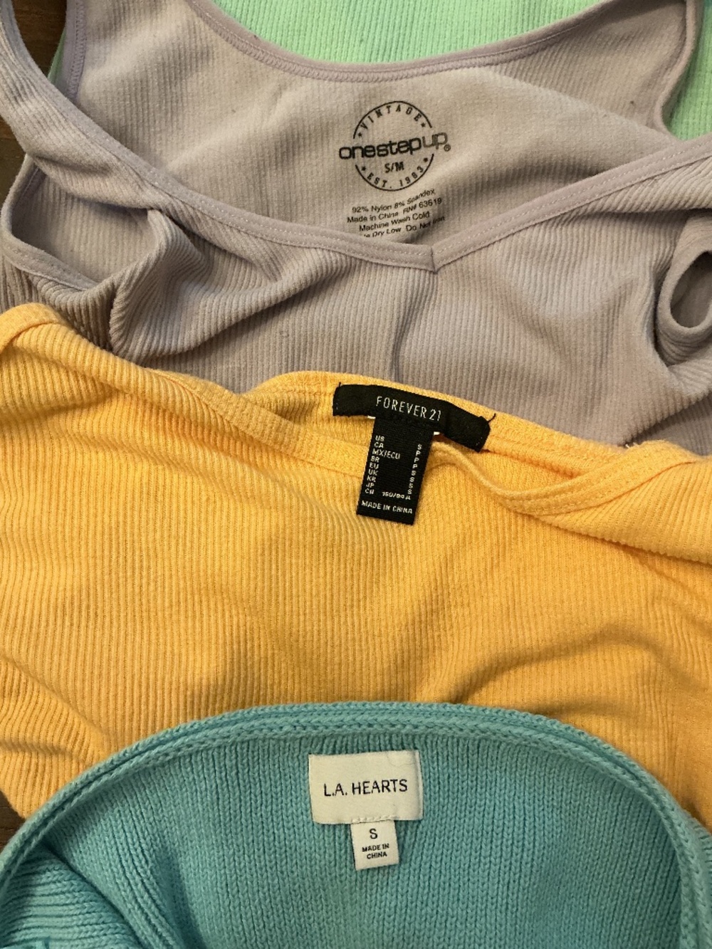 Lot of 4 gently used crop tops.  Size Small